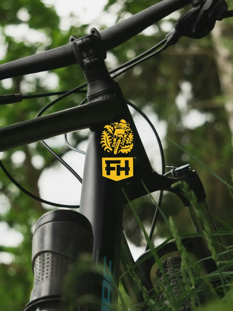 Finch Hatton badge logo and rider illustration
